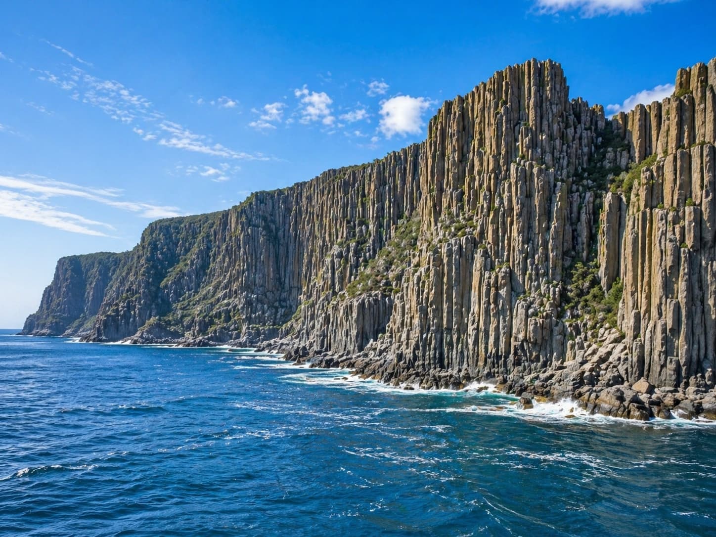 Cape Raoul ancient dolerite columns rising from the southern ocean
